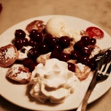 Poffertjes with cherries and liquor