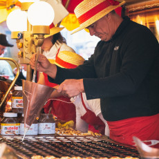The traditional cheese market Alkmaar - making poffertjes