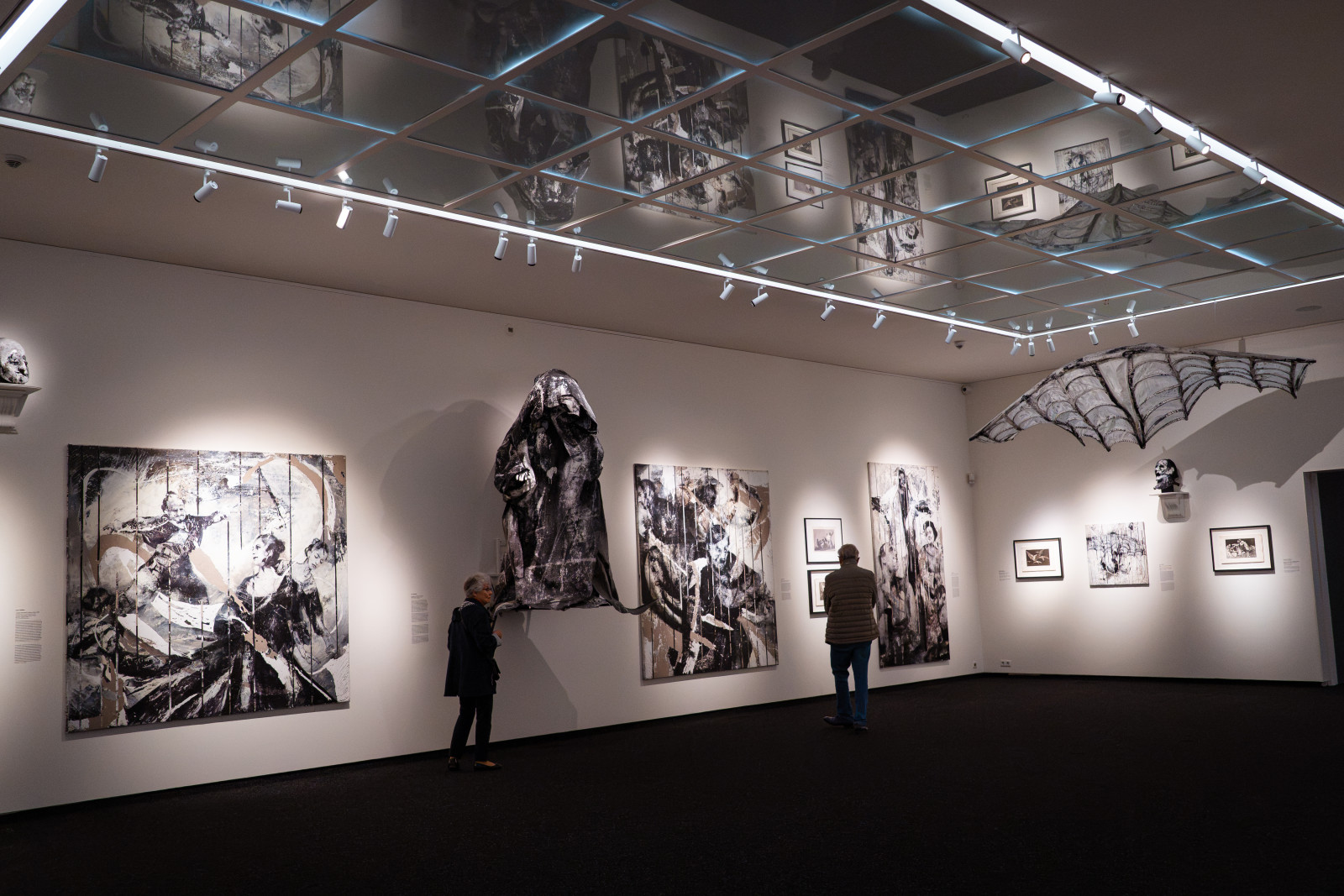 Visitors in the Lita Cabellut x Goya exhibition room in Amstelveen