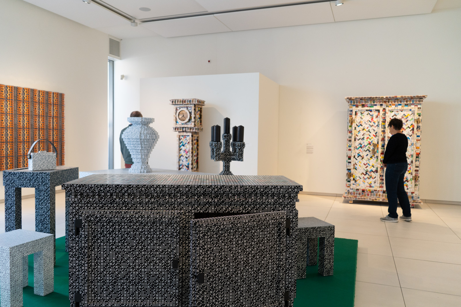 Furniture covered in patterned decoration in an exhibition at Museum JAN