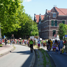 The Bigi Spikri parade winding through Amsterdam with a police escort