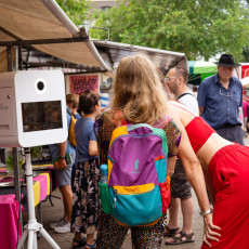 Women taking photos at De Wallen Festival 2026