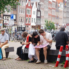 Visitors checking the booklet at the Wallen Festival Amsterdam 2026