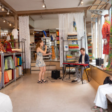 Wallen Festival Amsterdam 2026 concert in a textile shop