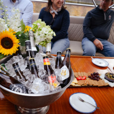 Ice bucket of drinks and a cheese platter on a Pure Boats canal cruise