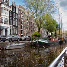Canal houses seen from a boat in Amsterdam