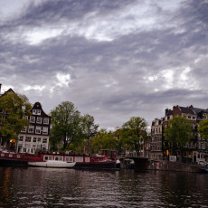 Canal houses at dusk from a boat in Amsterdam