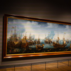 Large 17th-century painting of a sea battle in a gallery at the maritime museum