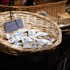 Painted oyster shells in a basket at a market stall in Veere