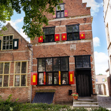 The Schotse Huizen with red and yellow shutters in Veere