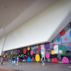 The Stedelijk Museum Amsterdam facade covered in colourful Kusama dots