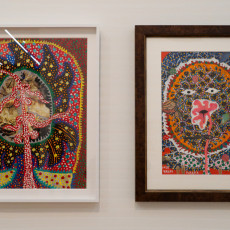 Two framed Kusama works on paper, dense with dots, faces and plants