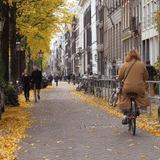 Amsterdam in yellow coat 06
