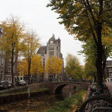 Amsterdam in yellow coat 07