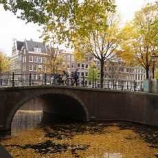Amsterdam in yellow coat 09