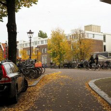 Amsterdam in yellow coat 14