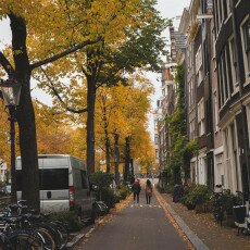 Amsterdam in yellow coat 17