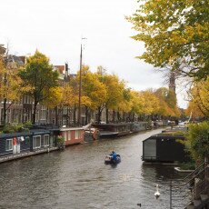 Amsterdam in yellow coat 24