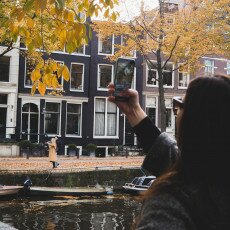 Amsterdam in yellow coat 19