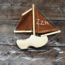 Toy sailing boat made from a wooden clog, one of the children's crafts at the Zuiderzeemuseum