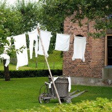 Laundry drying in the garden of a brick house in the Zuiderzee Village, Enkhuizen