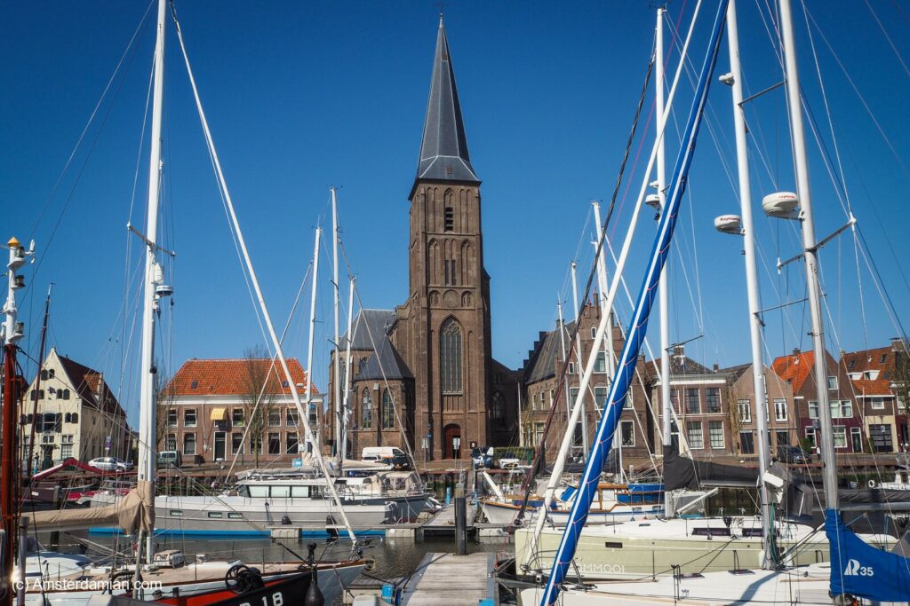 Boats moored in a marina in Harlingen