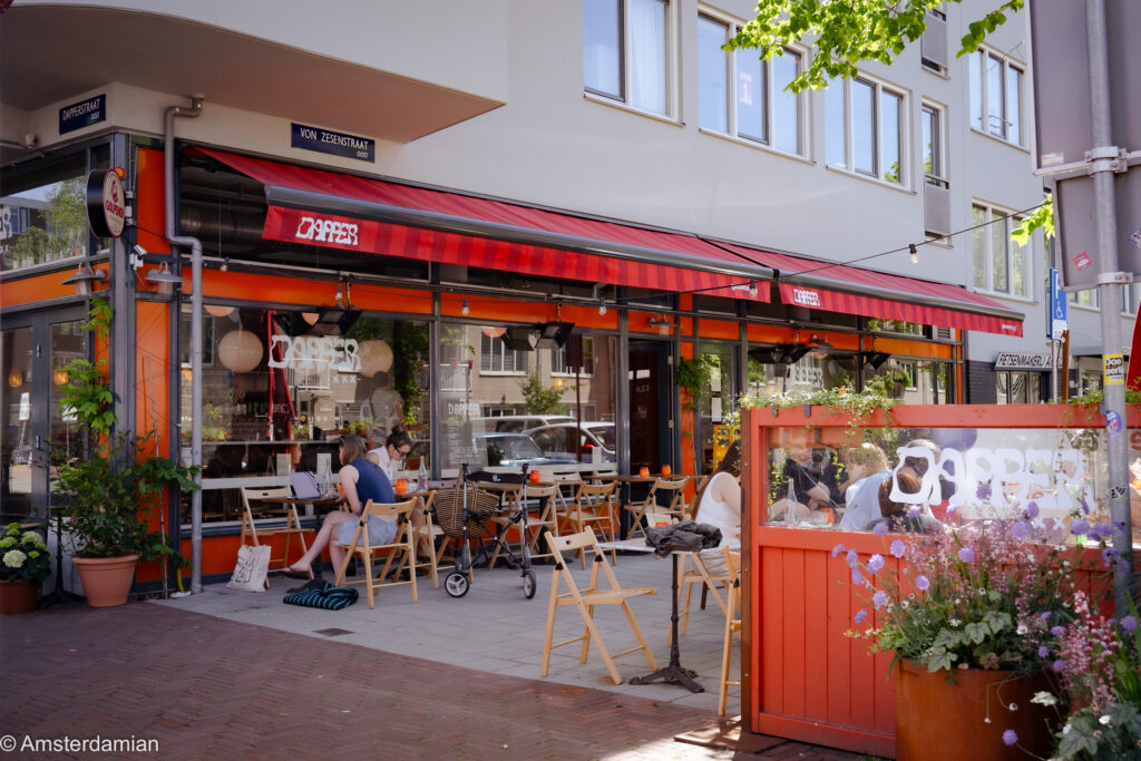 People sitting on a cafe terrace in Oud-Oost Amsterdam