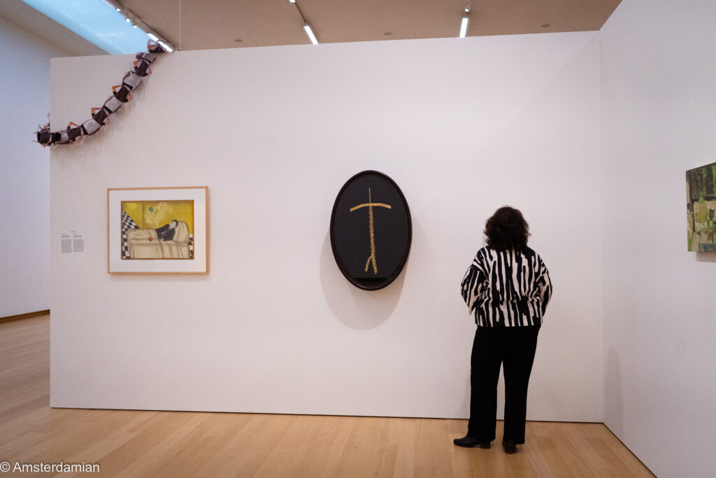 Visitor watching the exhibition at the Stedelijk Museum