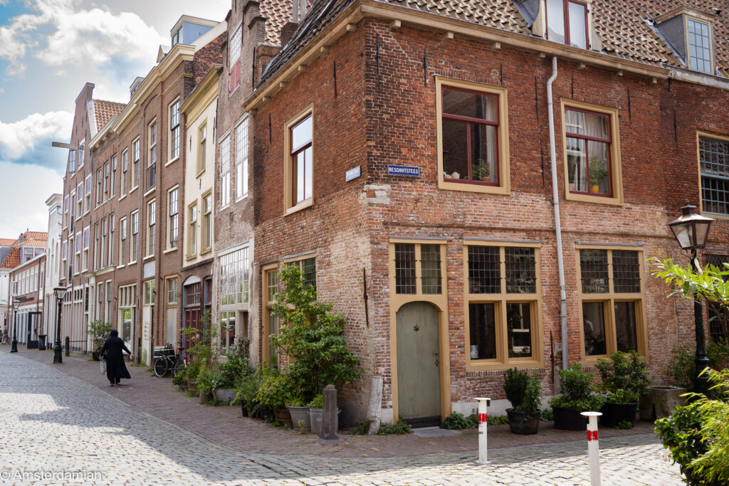 Quiet cobbled corner with old brick house at the Pilgrim Museum Leiden