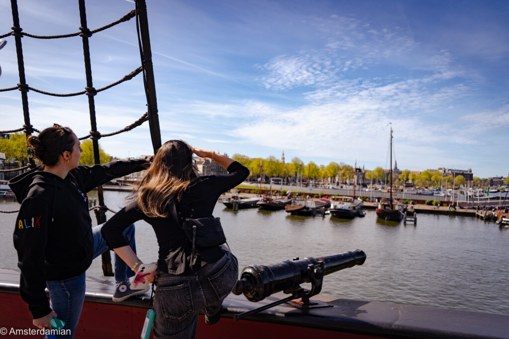 People on the East Indiaman Amsterdam ship looking over the city