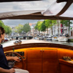 See Amsterdam in a Different Light: Canal Cruises with Pure Boats