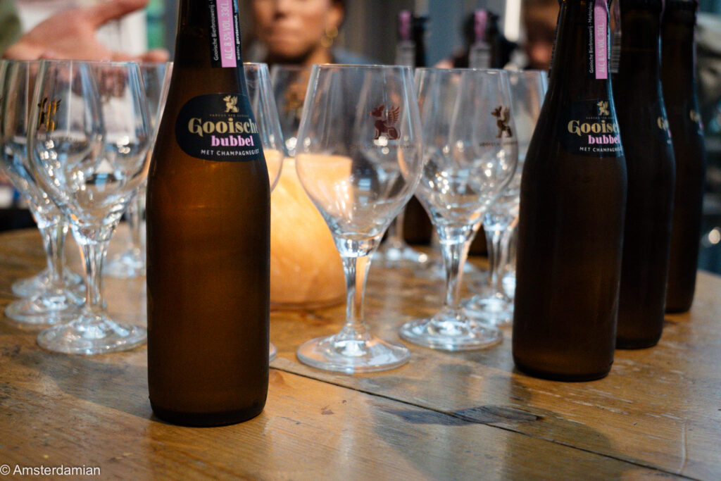 Bottles of Gooisch Bubbel and tasting glasses at the Gooische Bierbrouwerij